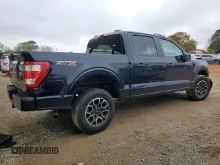2023 Ford F-150 XL with VIN 1FTEW1EP5PKF67674, listed as a Copart auction lot 50348795 with 23,176 mi miles and Salvage title. Bid and sale history available at DreamBid. Image 3.