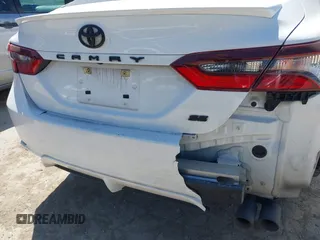 2023 Toyota Camry SE z VIN 4T1G11AK1PU774077, wystawiony jako IAAI lot #41747862 z przebiegiem 63 106 mil mil oraz . Historia ofert i sprzedaży dostępna na DreamBid. Obrazek 15.