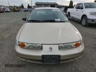 2001 Saturn SL z VIN 1G8ZH52831Z348124, wystawiony jako Copart lot #76058854 z przebiegiem 191 465 mil mil oraz Szkoda całkowita • Salvage title. Historia ofert i sprzedaży dostępna na DreamBid. Obrazek 5.
