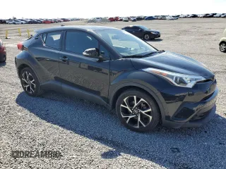 2018 Toyota C-HR XLE with VIN NMTKHMBX6JR054578, listed as a Copart auction lot 52027485 with 82,736 mi miles and Salvage Title. Bid and sale history available at DreamBid. Image 4.
