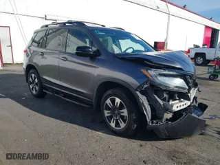 2019 Honda Passport Elite with VIN 5FNYF8H03KB007307, listed as a IAAI auction lot 41366590 with 99,375 mi miles. Bid and sale history available at carsss.com. Image 1.