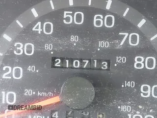 2000 Ford Econoline Cargo with VIN 1FTRE14W7YHA37668, listed as a IAAI auction lot 42001679 with 210,713 mi miles. Bid and sale history available at carsss.com. Image 12.