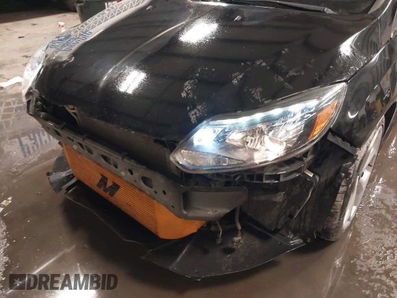 2014 Ford Focus ST with VIN 1FADP3L91EL375674, listed as a IAAI auction lot 41572329 with 100,253 mi miles and . Bid and sale history available at carsss.com. Image 6.