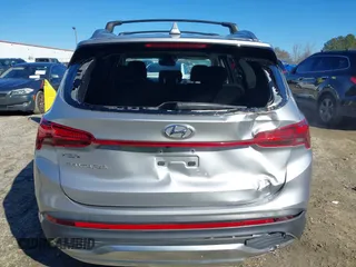 2021 Hyundai Santa Fe Essential with VIN 5NMS24AJ5MH361862, listed as a IAAI auction lot 41267193 with 32,965 mi miles. Bid and sale history available at carsss.com. Image 16.