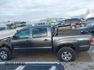 2015 Toyota Tacoma z VIN 3TMLU4EN8FM177785, wystawiony jako IAAI lot #41082160 z przebiegiem 156 761 mil mil oraz . Historia ofert i sprzedaży dostępna na DreamBid. Obrazek 15.