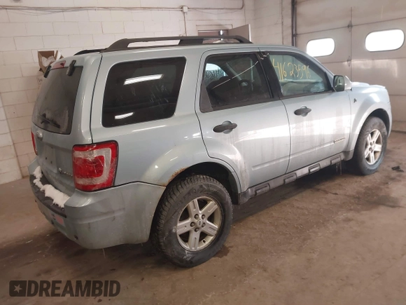 2008 Ford Escape Hybrid with VIN 1FMCU49H58KC63839, listed as a IAAI auction lot 41623596 with 218,566 mi miles and . Bid and sale history available at DreamBid. Image 4.