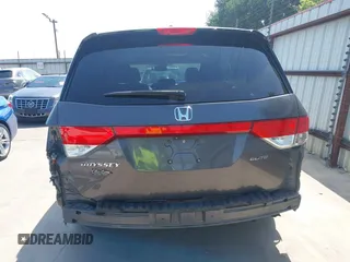 2014 Honda Odyssey Touring with VIN 5FNRL5H99EB075979, listed as a IAAI auction lot 42520154 with 99,314 mi miles and . Bid and sale history available at DreamBid. Image 19.