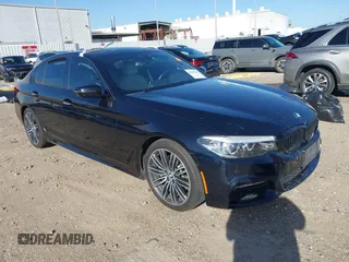2018 BMW 5 Series 530i with VIN WBAJA5C59JWA38170, listed as a IAAI auction lot 41682219 with 61,990 mi miles and . Bid and sale history available at carsss.com. Image 1.