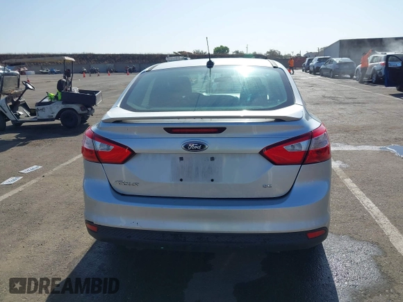 2012 Ford Focus SE z VIN 1FAHP3F28CL215997, wystawiony jako IAAI lot #42483639 z przebiegiem 101 518 mil mil oraz . Historia ofert i sprzedaży dostępna na DreamBid. Obrazek 16.