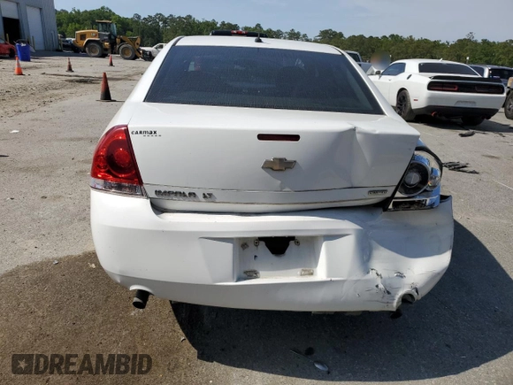 2014 Chevrolet Impala LT with VIN 2G1WB5E34E1130145, listed as a Copart auction lot 53788955 with 162,429 mi miles and Salvage Title. Bid and sale history available at DreamBid. Image 6.