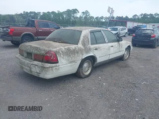 2001 Mercury Grand Marquis LS with VIN 2MEFM75WX1X633210, listed as a IAAI auction lot 42092135 with 161,963 mi miles and . Bid and sale history available at DreamBid. Image 4.