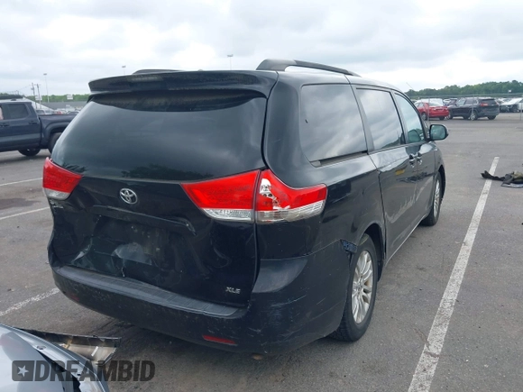 2012 Toyota Sienna XLE AAS with VIN 5TDYK3DC3CS255214, listed as a IAAI auction lot 42390803 with 113,425 mi miles and . Bid and sale history available at DreamBid. Image 4.
