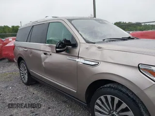 2018 Lincoln Navigator Reserve z VIN 5LMJJ2LT5JEL12492, wystawiony jako IAAI lot #42208861 z przebiegiem 186 337 mil mil oraz . Historia ofert i sprzedaży dostępna na DreamBid. Obrazek 6.