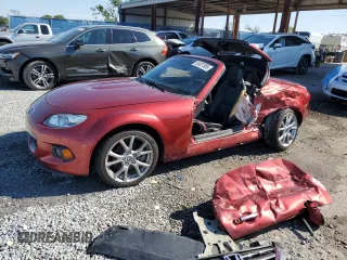 2015 Mazda MX-5 Miata Grand Touring z VIN JM1NC2PF7F0241209, wystawiony jako Copart lot #50487585 z przebiegiem Nie podano mil oraz Szkody całkowita. Historia ofert i sprzedaży dostępna na DreamBid. Obrazek 1.