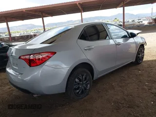 2018 Toyota Corolla L with VIN 2T1BURHE3JC051646, listed as a IAAI auction lot 41959264 with 123,036 mi miles and . Bid and sale history available at DreamBid. Image 4.