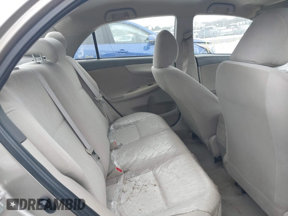 2009 Toyota Corolla with VIN 1NXBU40E19Z052903, listed as a IAAI auction lot 41305719 with 141,625 mi miles and . Bid and sale history available at carsss.com. Image 8.