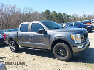 2021 Ford F-150 XL with VIN 1FTFW1E57MFB45980, listed as a IAAI auction lot 41775857 with 103,963 mi miles. Bid and sale history available at carsss.com. Image 13.