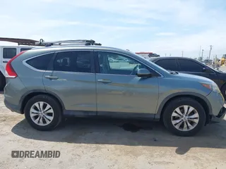 2012 Honda CR-V EX-L with VIN JHLRM3H74CC003987, listed as a IAAI auction lot 42046672 with 143,277 mi miles. Bid and sale history available at carsss.com. Image 13.
