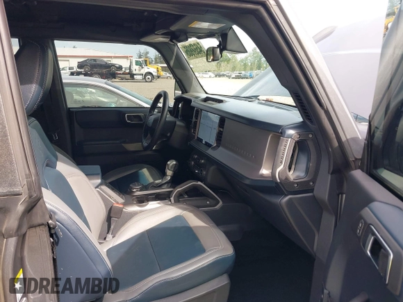 2023 Ford Bronco z VIN 1FMEE5BP5PLA97652, wystawiony jako IAAI lot #42149830 z przebiegiem 19 821 mil mil oraz . Historia ofert i sprzedaży dostępna na DreamBid. Obrazek 5.