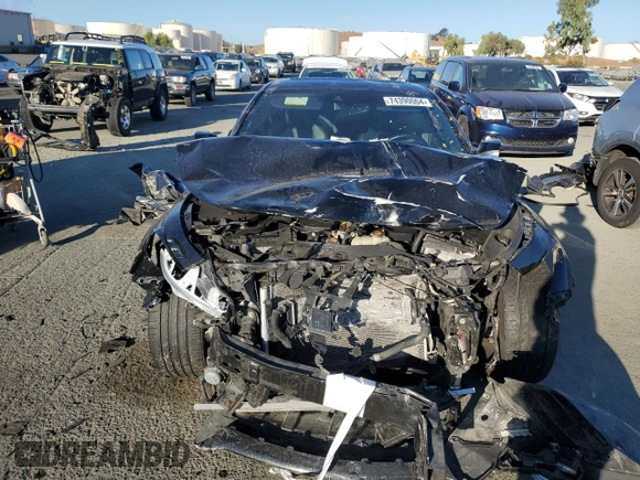 2020 Infiniti Q60 Luxe with VIN JN1EV7EK5LM340867, listed as a Copart auction lot 74390004 with 69,613 mi miles and Salvage Title. Bid and sale history available at carsss.com. Image 5.