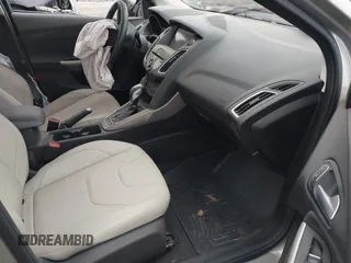 2016 Ford Focus Titanium with VIN 1FADP3N21GL346002, listed as a IAAI auction lot 39229347 with 114,683 mi miles and . Bid and sale history available at DreamBid. Image 5.