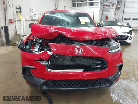 2024 Honda HR-V Sport z VIN 3CZRZ2H57RM748712, wystawiony jako IAAI lot #42113328 z przebiegiem 10 110 mil mil oraz . Historia ofert i sprzedaży dostępna na DreamBid. Obrazek 12.