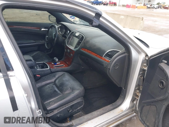 2012 Chrysler 300 Limited with VIN 2C3CCACGXCH212881, listed as a IAAI auction lot 41882643 with 160,645 mi miles. Bid and sale history available at carsss.com. Image 5.
