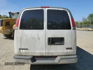 1998 GMC Savana z VIN 1GJHG39R2W1046054, wystawiony jako Copart lot #54447875 z przebiegiem 117 469 mil mil oraz Tytuł czysty. Historia ofert i sprzedaży dostępna na DreamBid. Obrazek 6.