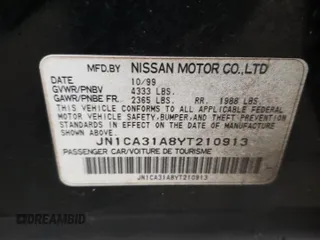 2000 Nissan Maxima GXE z VIN JN1CA31A8YT210913, wystawiony jako Copart lot #56272455 z przebiegiem 281 645 mil mil oraz Nie do naprawy • Non repairable. Historia ofert i sprzedaży dostępna na DreamBid. Obrazek 12.