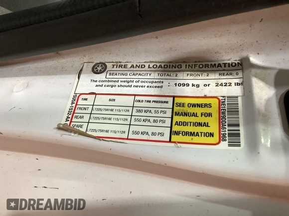 2013 Ford Econoline Cargo Commercial with VIN 1FTNE1EW9DDA61968, listed as a IAAI auction lot 42643038 with 121,719 mi miles and . Bid and sale history available at DreamBid. Image 12.