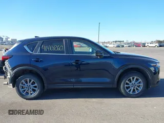 2023 Mazda CX-5 2.5 S Select Package with VIN JM3KFBBM7P0171770, listed as a IAAI auction lot 41464260 with 27,068 mi miles. Bid and sale history available at carsss.com. Image 14.