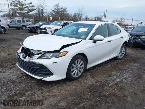 2020 Toyota Camry LE with VIN 4T1C11AK9LU912585, listed as a IAAI auction lot 41711816 with 142,751 mi miles. Bid and sale history available at carsss.com. Image 17.