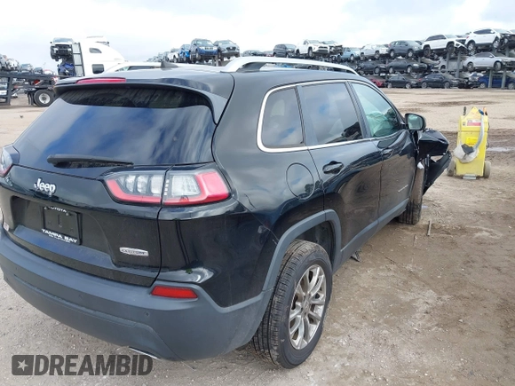 2019 Jeep Cherokee Latitude Plus with VIN 1C4PJLLN4KD119783, listed as a IAAI auction lot 41223282 with 84,917 mi miles. Bid and sale history available at carsss.com. Image 4.
