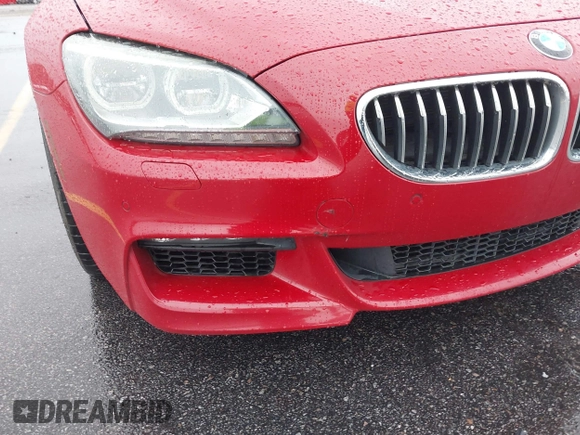 2013 BMW 6 Series 650i with VIN WBAYM9C53DDW20243, listed as a IAAI auction lot 41762838 with 100,905 mi miles and . Bid and sale history available at carsss.com. Image 6.