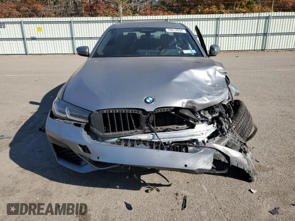 2023 BMW 5 Series M550i xDrive with VIN WBA13BK09PCN61839, listed as a Copart auction lot 76614694 with 16,279 mi miles and Salvage title. Bid and sale history available at DreamBid. Image 5.