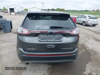 2015 Ford Edge Titanium z VIN 2FMTK3K81FBB88882, wystawiony jako IAAI lot #42184698 z przebiegiem 161 858 mil mil oraz . Historia ofert i sprzedaży dostępna na DreamBid. Obrazek 16.