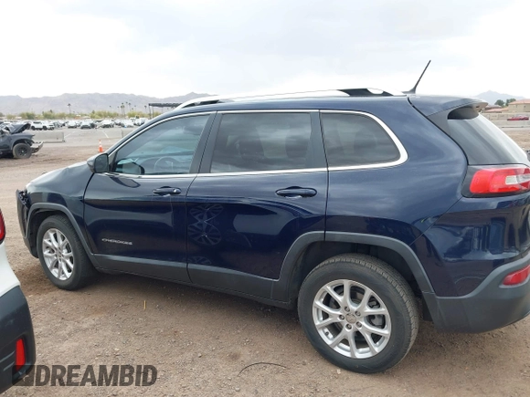 2015 Jeep Cherokee Latitude with VIN 1C4PJLCB8FW506398, listed as a IAAI auction lot 41796516 with 95,204 mi miles and . Bid and sale history available at DreamBid. Image 13.