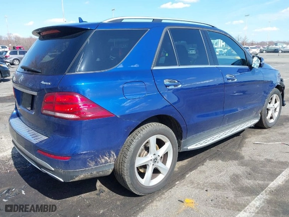 2018 Mercedes-Benz GLE with VIN 4JGDA5HB6JB127371, listed as a IAAI auction lot 41879303 with 123,238 mi miles. Bid and sale history available at carsss.com. Image 4.