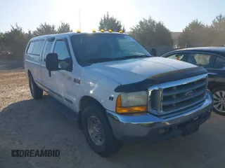 1999 Ford Super Duty F-250 XL with VIN 1FTNX20L5XEC55084, listed as a IAAI auction lot 42050064 with 135,884 mi miles. Bid and sale history available at carsss.com. Image 1.
