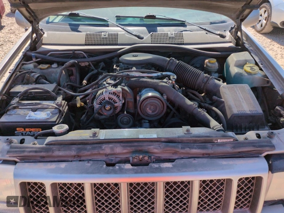 1998 Jeep Grand Cherokee Limited z VIN 1J4GZ88Z8WC306919, wystawiony jako Copart lot #61505725 z przebiegiem 195 329 mil mil oraz Czysty tytuł • Clean title. Historia ofert i sprzedaży dostępna na DreamBid. Obrazek 11.