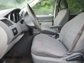 2009 Dodge Grand Caravan SE with VIN 2D8HN44E99R541957, listed as a Copart auction lot 60810425 with 172,392 mi miles and Salvage title. Bid and sale history available at DreamBid. Image 7.