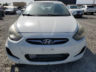 2014 Hyundai Accent GLS with VIN KMHCT4AE8EU714105, listed as a Copart auction lot 51469795 with 252,219 mi miles and Clean Title. Bid and sale history available at carsss.com. Image 5.