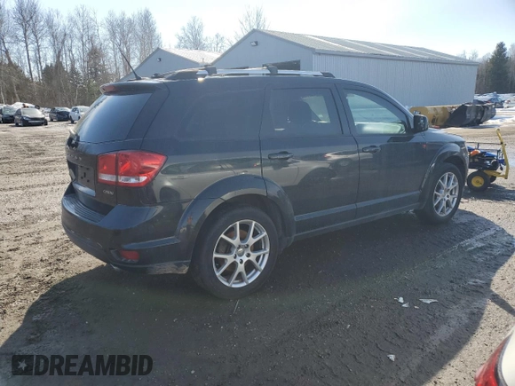 2013 Dodge Journey Crew with VIN 3C4PDCCG8DT701083, listed as a Copart auction lot 48292095 with 129,494 mi miles and Clean title. Bid and sale history available at DreamBid. Image 3.