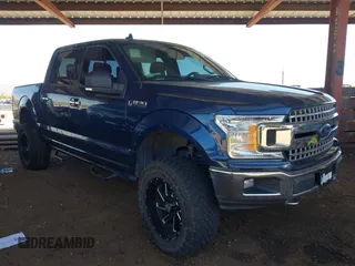 2018 Ford F-150 XL with VIN 1FTEW1E54JKD26579, listed as a IAAI auction lot 42324295 with 92,752 mi miles and . Bid and sale history available at DreamBid. Image 1.