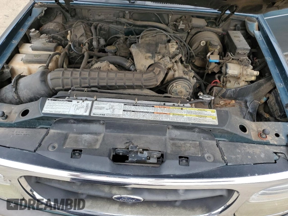 1996 Ford Explorer XL with VIN 1FMDU32X4TUD32047, listed as a Copart auction lot 55014665 with 171,139 mi miles and Salvage title. Bid and sale history available at DreamBid. Image 11.