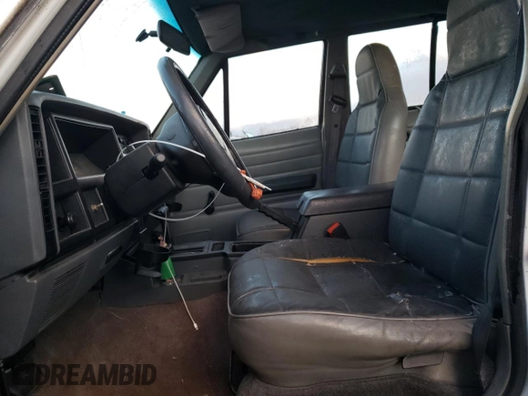 1995 Jeep Cherokee SE с VIN 1J4FT28S1SL634660, выставлен на аукционе Copart как лот 41530075 с пробегом Не указан миль и Списание • Salvage title. История ставок и продаж доступна на DreamBid. Изображение 7.