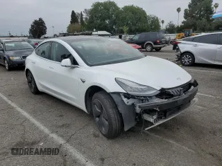 2020 Tesla Model 3 Standard Range Plus with VIN 5YJ3E1EA5LF747010, listed as a Copart auction lot 50937975 with Not Provided miles and Salvage Title. Bid and sale history available at DreamBid. Image 4.
