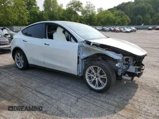2022 Tesla Model Y Long Range z VIN 7SAYGDEE5NF355624, wystawiony jako Copart lot #58058465 z przebiegiem 33 784 mil mil oraz Szkoda całkowita • Salvage title. Historia ofert i sprzedaży dostępna na DreamBid. Obrazek 4.