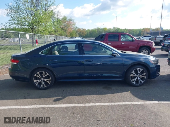 2021 Volkswagen Passat SE with VIN 1VWSA7A36MC010749, listed as a IAAI auction lot 42141065 with 43,571 mi miles and . Bid and sale history available at DreamBid. Image 13.