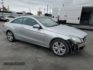 2012 Mercedes-Benz E with VIN WDDKJ5KB0CF134211, listed as a Copart auction lot 53753085 with 116,236 mi miles and Salvage Title. Bid and sale history available at DreamBid. Image 4.